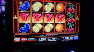 fa77 wins feed showing recent sports betting and slot payout results on mobile screen