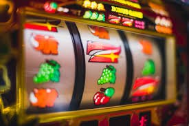 fa77 slot game lobby displaying categorised casino-style slot titles on a mobile screen